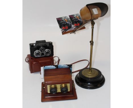 Harris and Sheldon, an Edwardian stereoscopic viewer with brass column on circular base, 50cm high, together with a mahogany 