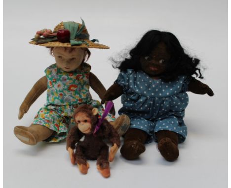 A Norah Wellins brown felt doll, a Chad Valley felt doll with painted facial features and a felt monkey, 12cm