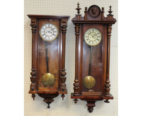 A walnut weight driven Vienna regulator with white enamel dial. 102cm high and a&nbsp;walnut weight driven Vienna regulator, 