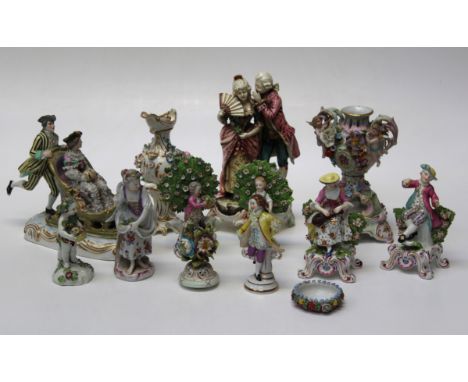Four 20th century Dresden bocage figures, a 19th century Continental porcelain sleigh figural group, 26cm wide, a German flor