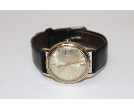 A 9ct gold Rotary gentlemans wristwatch. 35mm case diameter, 18mm lug width. Gross weight including strap 37.08gms