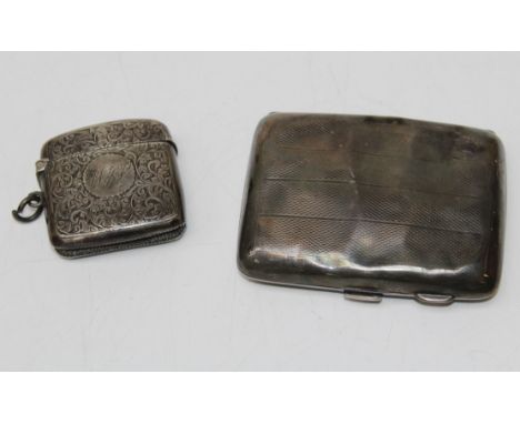 Silver cigarette case and petrol lighter. Case Birmingham 1932, lighter Birmingham 1903. 56gm