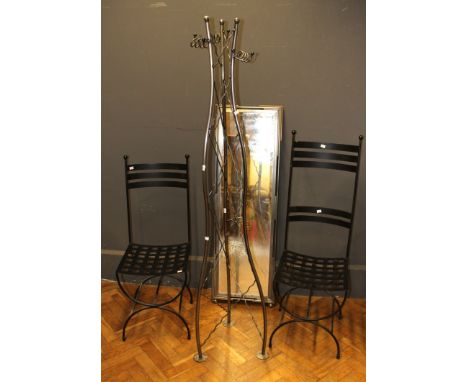 Four pieces of Modernist furniture, comprising an aluminium hallstand, steel framed cheval mirror and two steel ladder back c