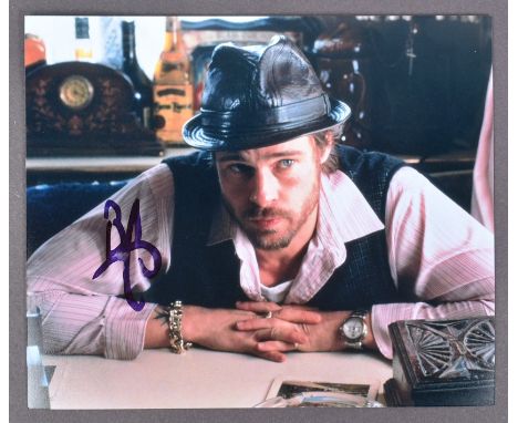 Brad Pitt - Snatch (2000) - autographed 8x10" promotional photograph from the movie. Signed in black ink to a light area of t