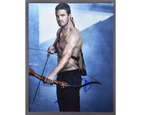 Stephen Amell - Arrow (DC Series) - autographed 8x10" photograph from the series, signed in blue ink to a central area.&nbsp;
