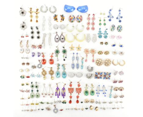 An assorted collection of costume jewellery earrings. The lot to include; gold &amp; silver tone metal, enamel, white stones,