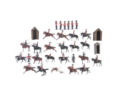 A collection of assorted vintage Britains lead toy soldiers to include Household Cavalry, Lancers, Guards and Rifle Regiments