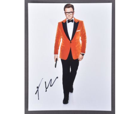 Kingsman II The Golden Circle (2017) - Taron Egerton - autographed 8x10" colour photograph from the movie, signed in black in