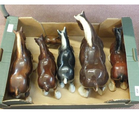 A group of ceramic horse figures