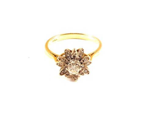 An 18ct Gold Diamond set ring of flower form, size K