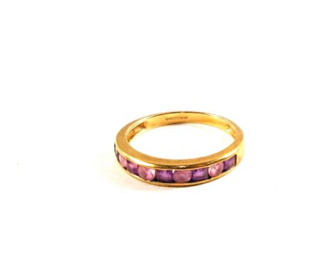 A 9ct Gold Amethyst set half eternity ring, size K