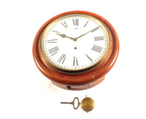 A circular Mahogany dial clock (with pendulum and key)