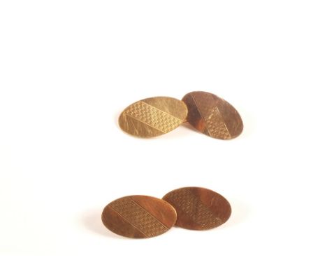 A pair of 9ct Gold oval Gold engine turned cufflinks
