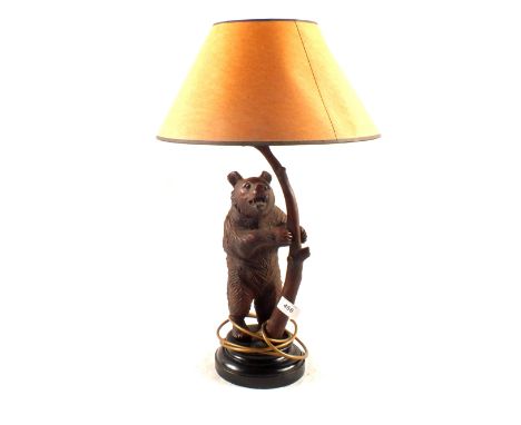 A Black Forest style bear lamp with shade by Woolpit Interiors, height 16"