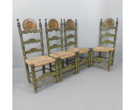 A set of four Andalusian Spanish rush-seated ladder-back dining chairs in polychrome finish. 