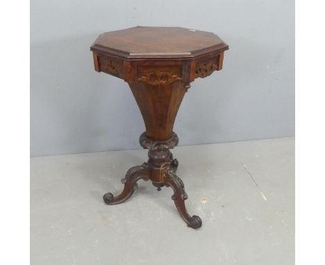 A 19th century rosewood octagonal trumpet sewing table, with carved decoration and tripod base. A/F. W43c, H73cm.Some decorat