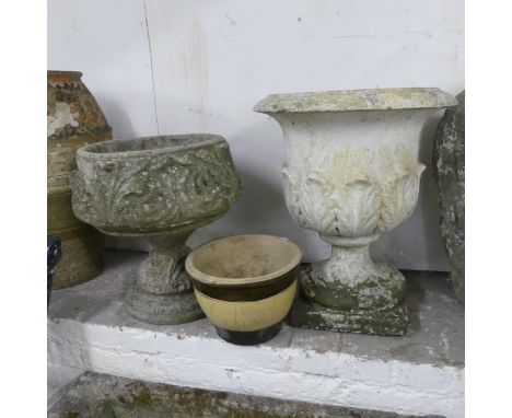A painted weathered concrete Grecian style garden two-section urn, another concrete urn and a ceramic planter. Largest D50cm,