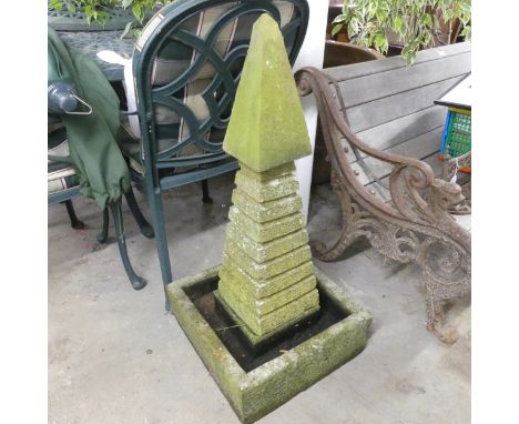 An unusual three-section weathered concrete three-section obelisk planter. W45cm, H96cm.