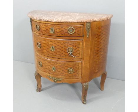 A French demi-lune marble topped commode chest of three drawers, with brass mounds and inlaid lattice decoration. W85, H84cm,
