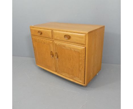 ERCOL - A mid-century blonde elm sideboard, W91, H69, D45cm.Good condition, maker's label to door. Some light use-related sur