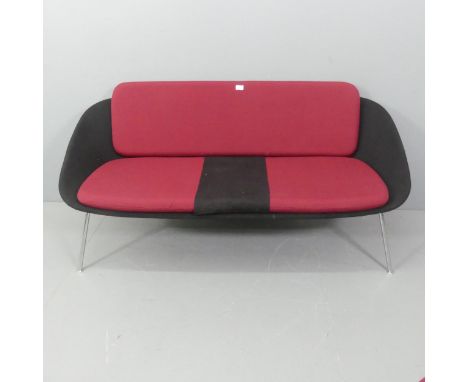OCEE & FOUR DESIGN - A 'DISHY' low backed sofa in red/black upholstery, with chromed tubular steel legs. RRP for these models