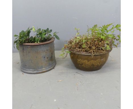 A glazed terracotta semi-circular garden planter, W38cm, H38cm, and another planter. (2) 