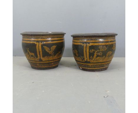 A pair of glazed ceramic garden urns with Grecian design decoration. D41cm, H32cm. 