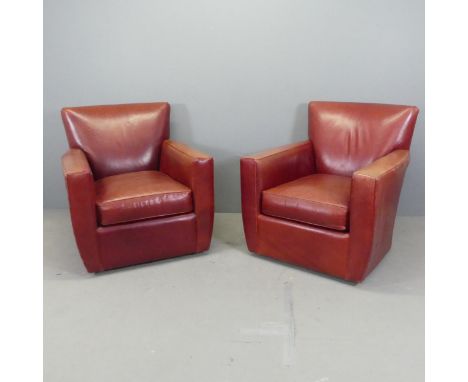 CRATE & BARREL - A pair of vintage American red-leather upholstered swivel armchairs. 