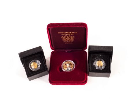 Two 2009 Gold Half Crown Proof coins, both in plastic capsules, together with a 2002 Ghana 500 Sika 9ct gold portrait coin in