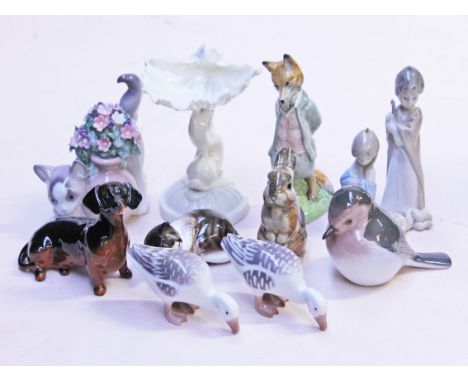 A mixed lot to include a Lladro cat, a Grainger Worcester pedestal, three Lladro hanging figures, two Doulton animals, three 