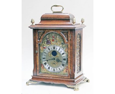 A reproduction carriage clock the dial signed Christiaan Huygens, the spring driven movement striking on eight rods. H50cm
