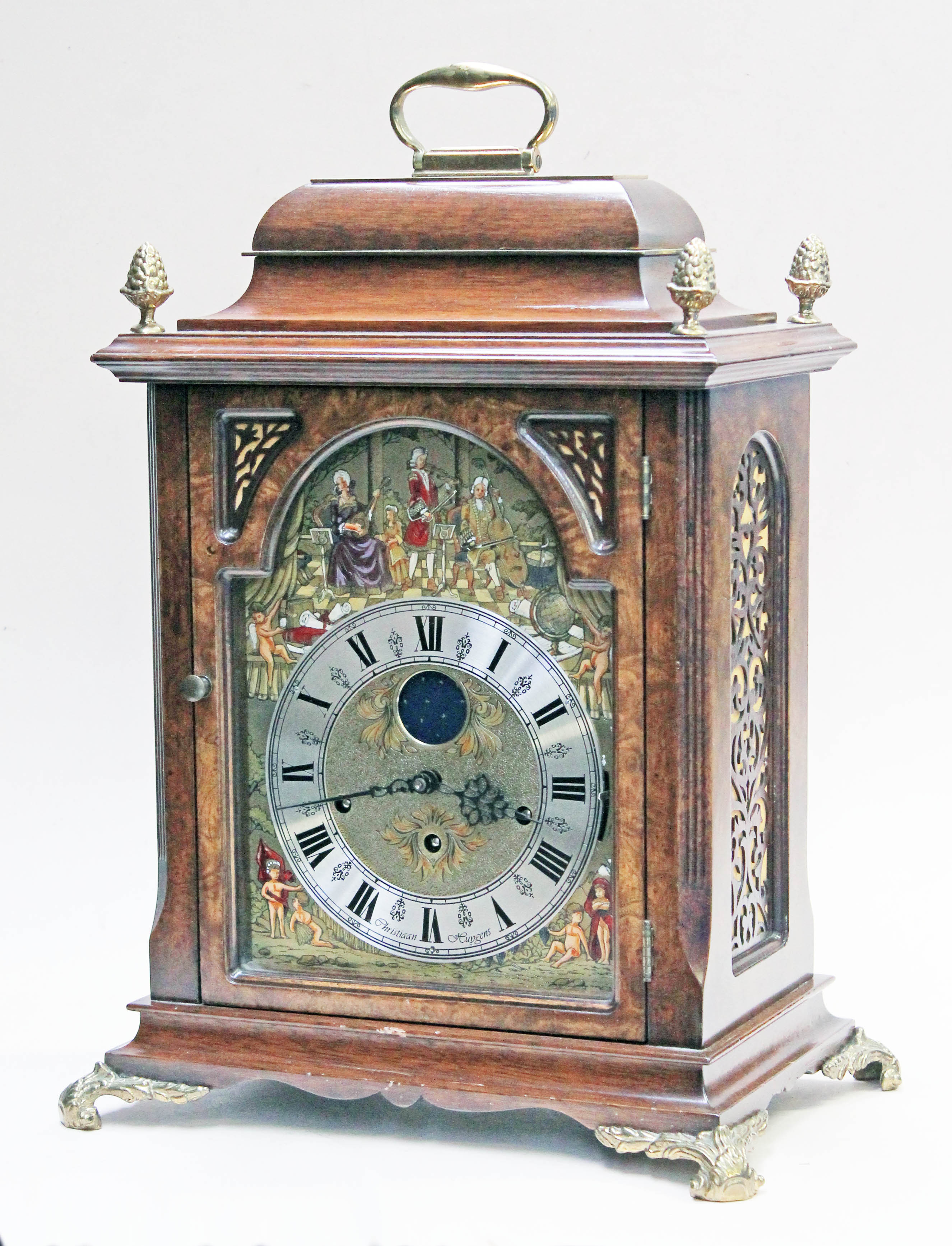 A reproduction carriage clock the dial signed Christiaan Huygens, the