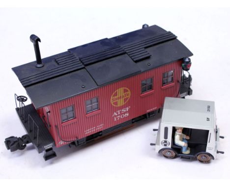 An Aristo-Craft G scale model railway ATSF 1708 tracking cleaning car and another model