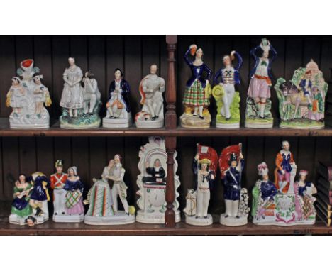 A group of fifteen 19th Century Staffordshire figures. Condition - 3 dancers, man playing lute, solider and woman appear in g