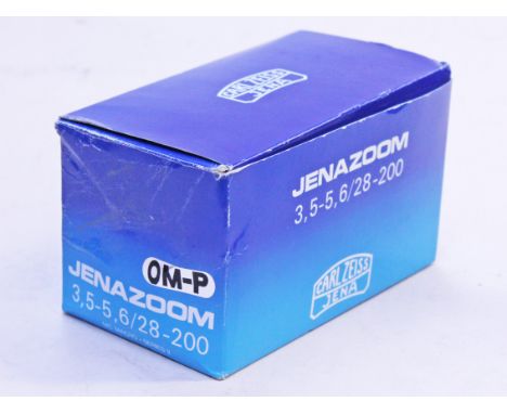 A Carl Zeiss Jenazoom camera lens. Condition - boxed and appears unused.