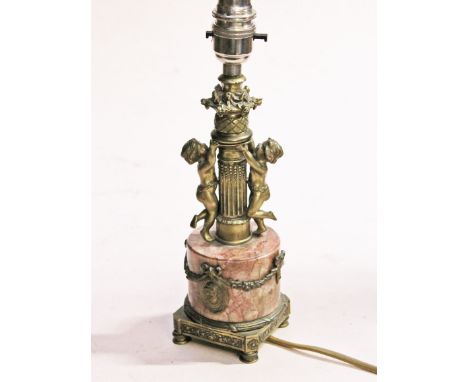 A Continental metal and marble table lamp, height 28cm. Condition - wear to gilding, general wear.