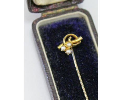 A 15ct gold seed pearl stick pin and box