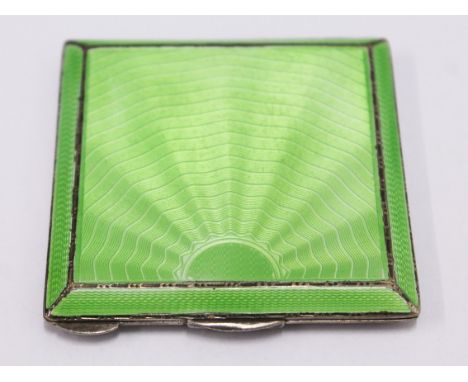 An Art Deco silver and green enamel compact, Walker & Hall, Chester 1938, 7cm x 7cm