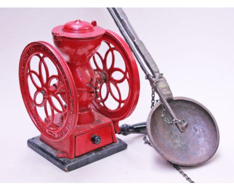 A Suffolk Iron Foundry cast iron adjustable coffee grinder together with an old African coffee bean roasting pan. Condition -