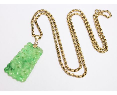 A carved jade pendant, length 4.3cm, on yellow metal chain 74cm, chain wt. 14g
