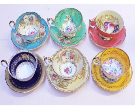 A set of six Aynsley cups and saucers. Condition - light blue cup has broken and repaired handle, no further damage, general 