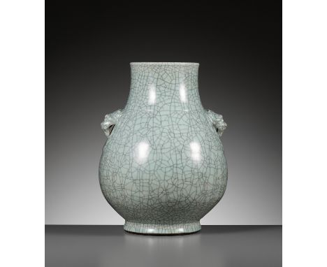 A RARE GUAN-TYPE VASE, HU, QIANLONG MARK AND PERIOD 乾隆款及年代仿官釉雙耳壺China, 1736-1795. The ovoid body supported on a thick spreadi