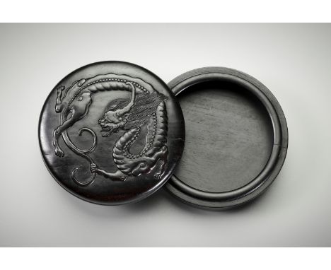 A ZITAN 'CHILONG' BOX AND COVER, QING DYNASTY 清代紫檀螭龍紋蓋盒China, 1750-1850. Of circular form with straight sides, the cover slig