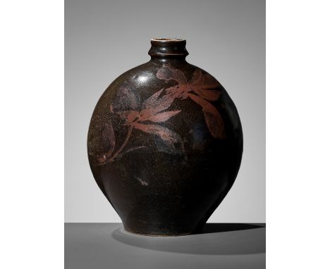 A RUSSET-PAINTED BLACK-GLAZED HENAN JAR, JIN TO YUAN DYNASTY 金至元河南窯口黑釉鉄鏽斑罐China, 1115-1368. The globular body rising from a t