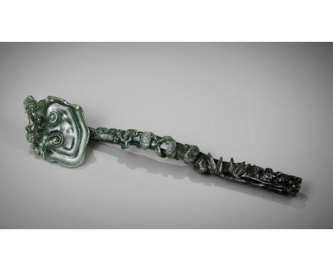 A SPINACH-GREEN JADEITE 'LINGZHI AND THREE FRIENDS OF WINTER' RUYI SCEPTER, 19TH CENTURY 十九世紀菠菜綠歲寒三友翡翠如意China. Finely carved 