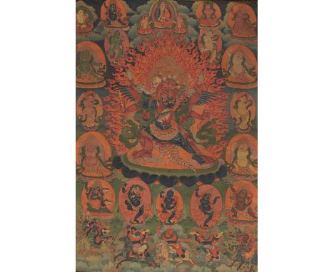 A THANGKA OF GURU DRAGPO, 18TH-19TH CENTURY 十八至十九世紀忿怒蓮師唐卡Tibet. Distemper on cloth. The wrathful three-headed deity with Garu