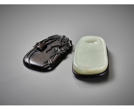 A PALE CELADON JADE INKSTONE WITH MATCHING ZITAN STAND AND COVER, QING DYNASTY 清代青玉硯China, 18th-19th century. The well-polish