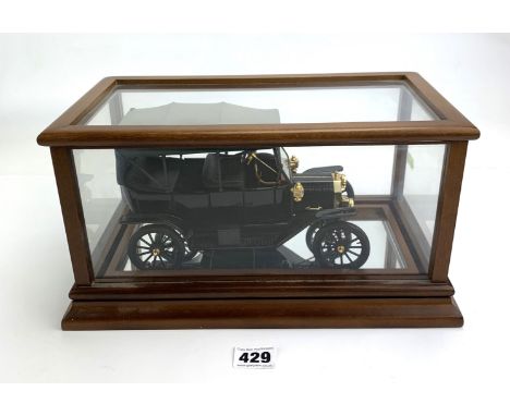 Cased vintage model Ford car, case measures 13" long x 7" wide x 7" high