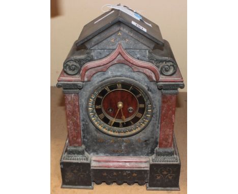 A Victorian slate mantel clock with French eight day movement. 