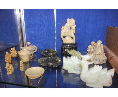 Assorted jade and soapstone to include two jade birds, lotus leaf dishes, a jade elephant, soapstone figures (af) 